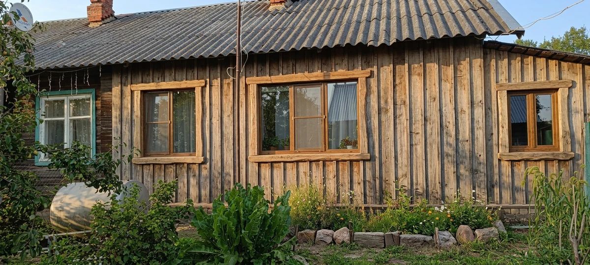 Дизайн фасада в стиле Деревенский — фото фасада от нейросети AI Facade